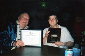 Mary and Hank Walden. Mary received a plaque from her team. 